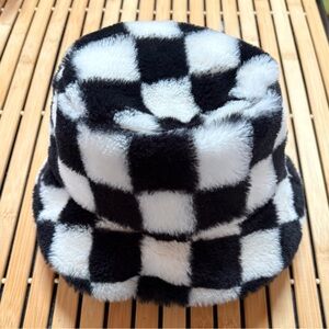 Claire’s Cute Black and White Checkered Faux Fur Bucket Hat